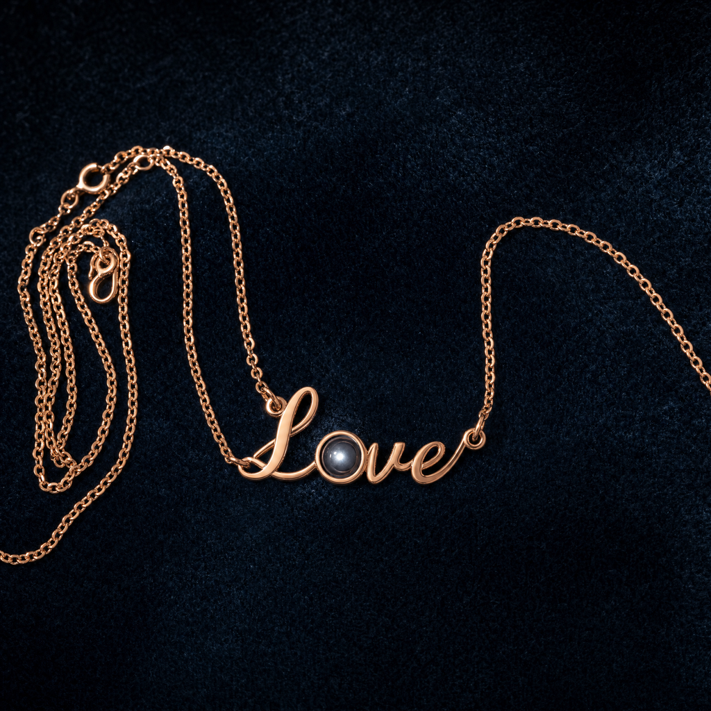 Projection necklace laid flat on midnight velvet